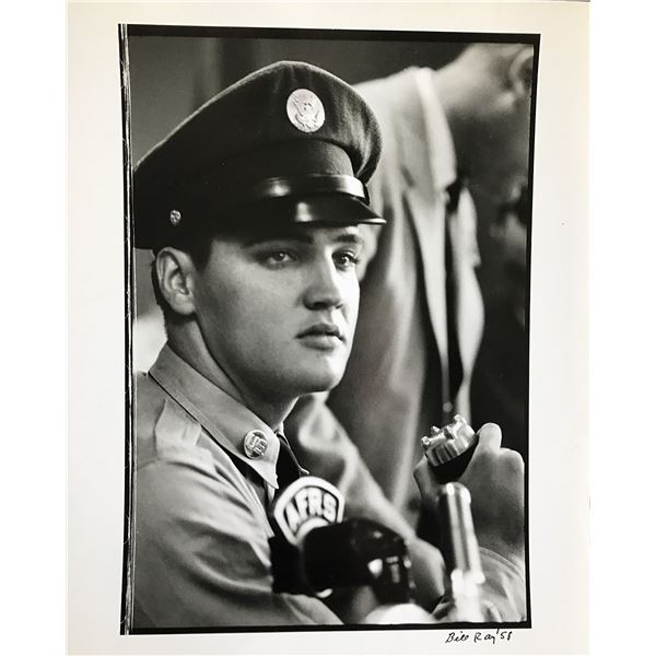 Photographer: Bill Ray - Elvis at Microphone.