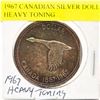 1967 CANADIAN SILVER DOLLAR HEAVY TONING