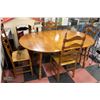 Image 1 : WOODEN DINING TABLE WITH 2 DROP LEAFS, CENTER LEAF AND 4 CHAIRS 68" X 48" X 29"