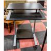Image 1 : NEWLY ASSEMBLED HEIGHT ADJUSTABLE BLACK DESK/RISER APPROXIMATELY 27.5" WIDE, MULTIPLE SHELVES, LOCKI