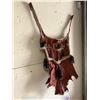 Image 2 : HANDMADE HIDE AND SEASHELL APRON