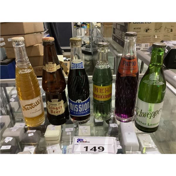 6 ASSORTED VINTAGE BOTTLES ALL FULL, BRANDS INCLUDE; SCHWEPPES, SESLITTS, CANADA DRY, MISSION, PATIO