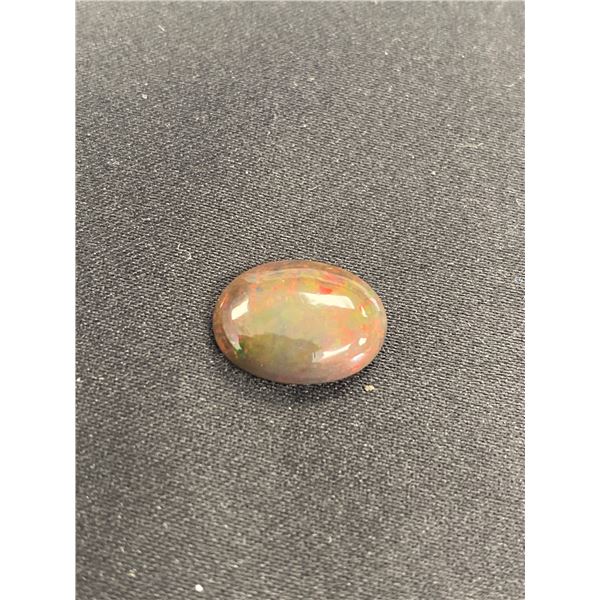 BIG BLACK WELO OPAL, 3.88CT, 14.48 X 10.95 X 4.57MM, OVAL CABOCHON, ETHIOPIA, HEATED, LOTS OF PLAY