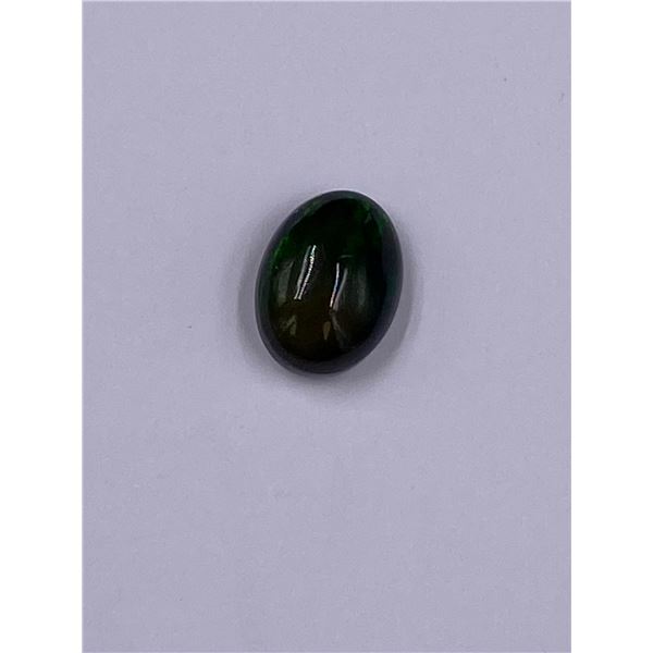 BLACK WELO OPAL 2.525CT, 11.31 X 8.49 X 5.24MM, OVAL CABOCHON, ETHIOPIA, HEATED, LOTS OF PLAY OF