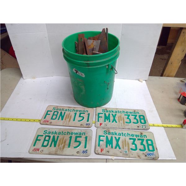 Bucket of Licese Plates and Meta.