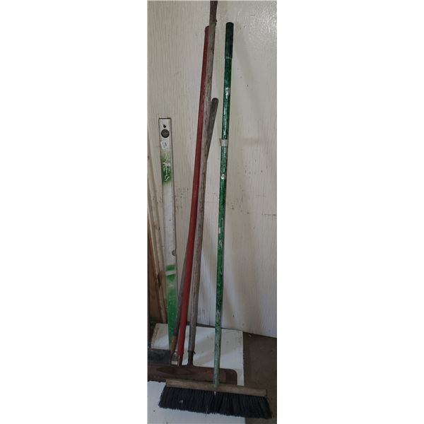 LOT OF WELL USED LANDSCAPE RAKES, BROOM, OTHERS