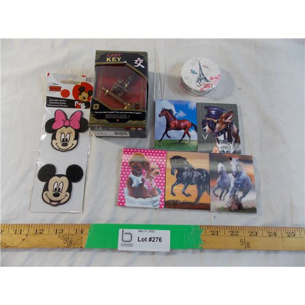 Cast Key puzzle, paper note pads, mickey mouse badges