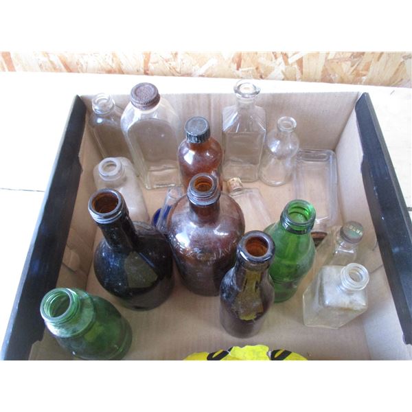 box with colored bottles