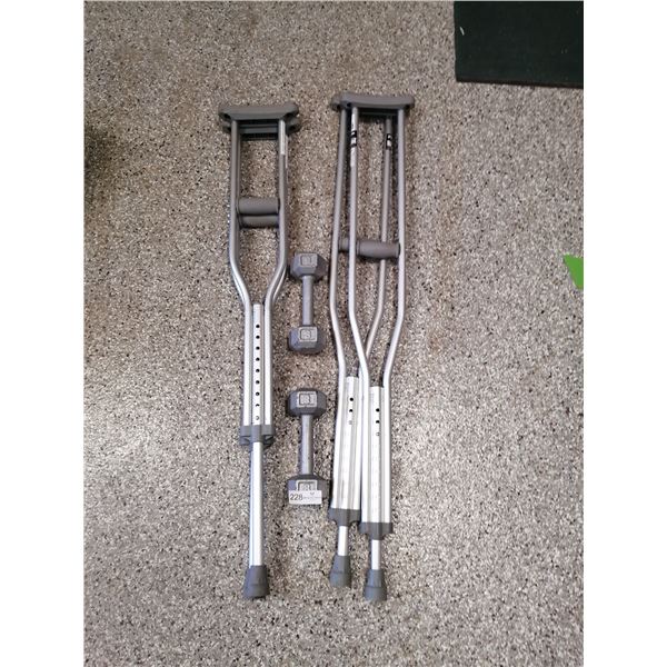 Two Pairs of Crutches and a Pair of 8 lb Dumbbells