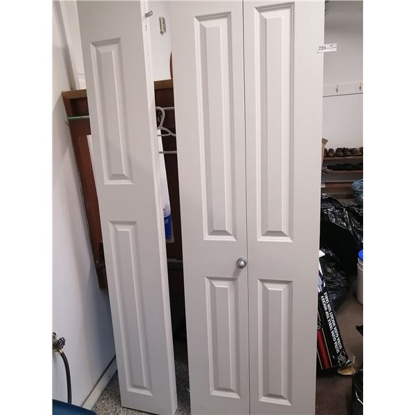 Two Folding Closet Doors