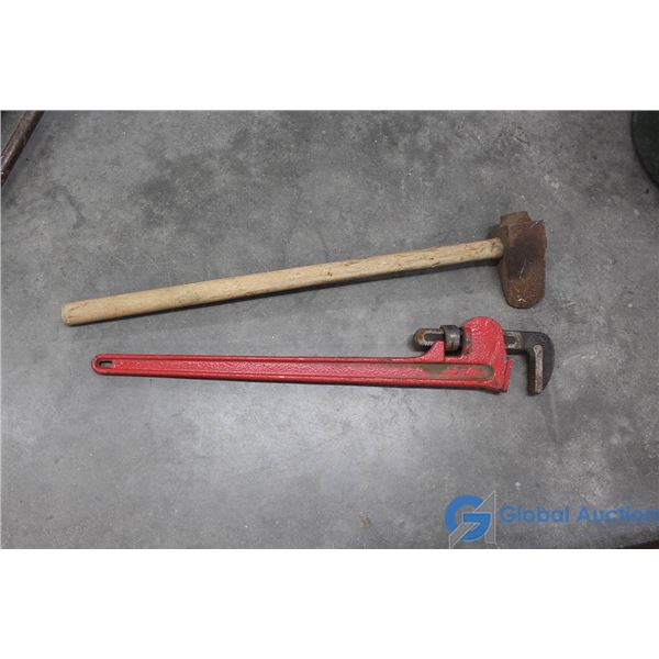 **Pipe Wrench and Sledge Hammer