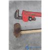 Image 2 : **Pipe Wrench and Sledge Hammer