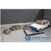 Image 1 : Vintage Roller Skates and Toy Police Car
