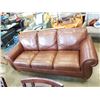 Image 1 : NATUZZI STUDDED LEATHER SOFA