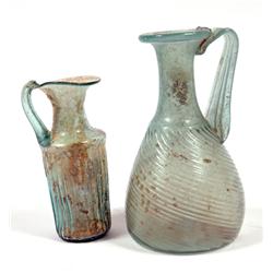 A lovely pair of Roman Ribbed Glass Vessels, circa 3rd