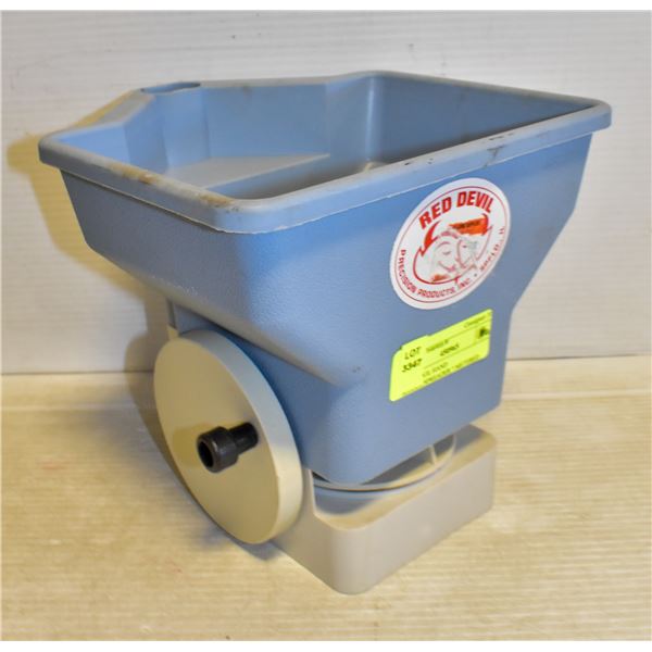 RED DEVIL HAND SEEDER/SPREADER ?.METERED
