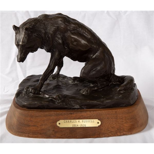 After C.M. Russell - "Wolf With Bone/Timber Wolf"
