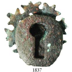 Bronze keyhole and ornate cover.