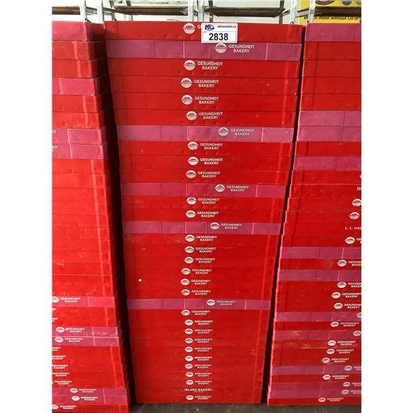STACK OF 32 BREAD RACKS