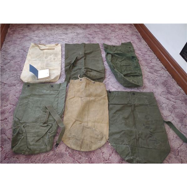 SIX WWII DUFFEL BAGS & US NAVY THE BLUE JACKETS' MANUAL