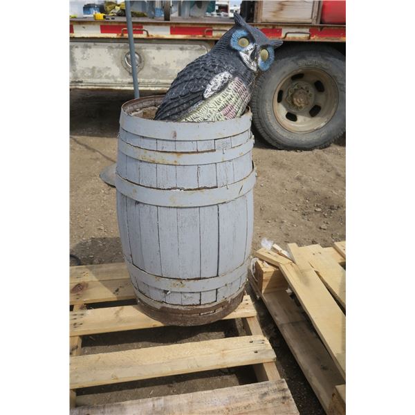 Antique Barrel filled with Lawn Ornaments