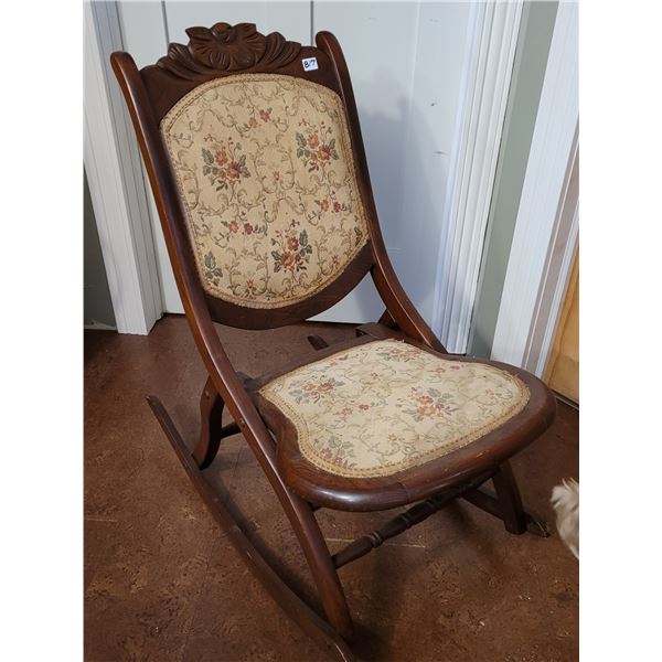 Vintage wooden folding rocking chair. Cushioned seat & back. Canadian made.