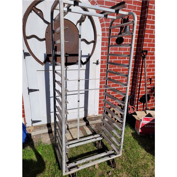 Rolling metal storage rack for trays