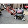 Image 1 : 5 Gallon Air Compressor with hose carrier, mounted on a lawn mower chassis for easy moving.