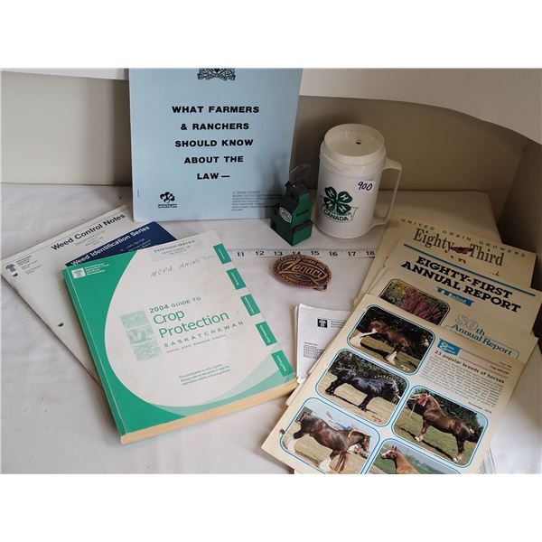 Farming informational booklets, 4H mug, Elevator bottle opener & Sask Wheat Pool Legacy buckle.