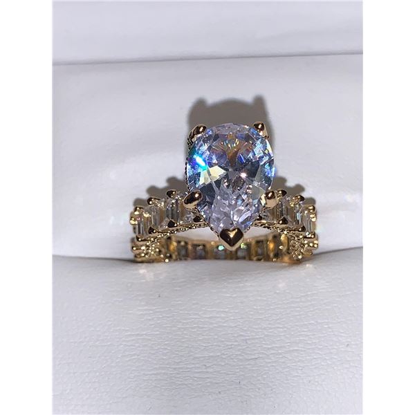 Ladies 1.50 Carat Pear Cut Solitaire Engagement Ring with Bezel baquette Stone set Band size 7