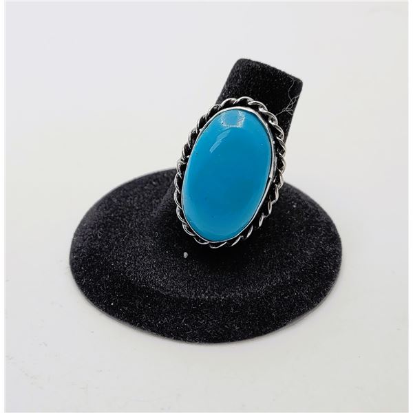 24)  LAB CREATED LARGE OVAL TURQUOISE RING WITH