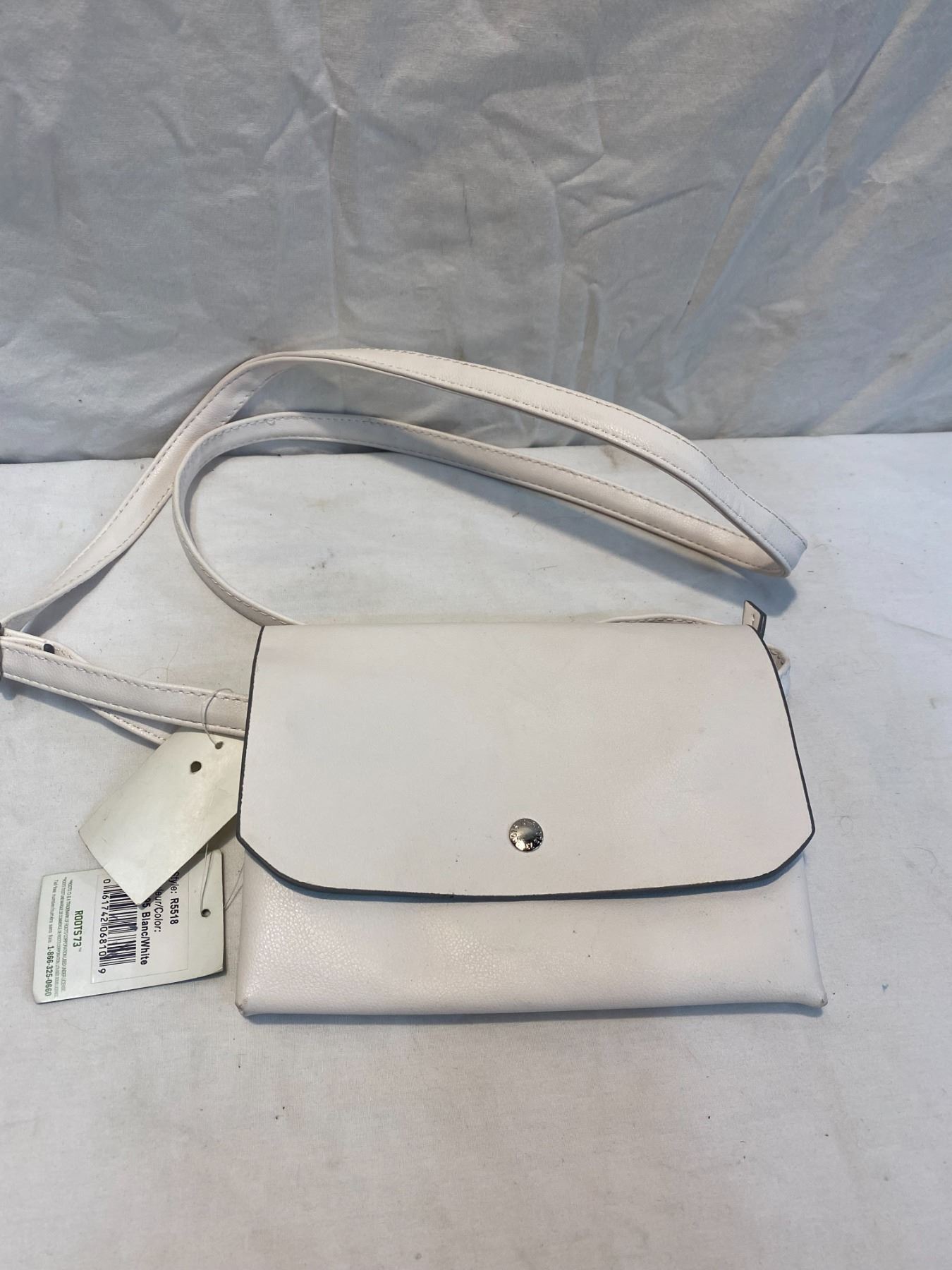 Roots 73 purse