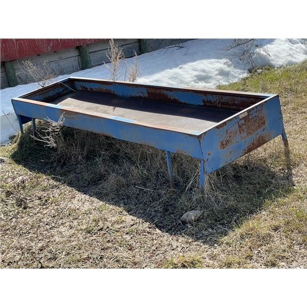 Blue cattle trough