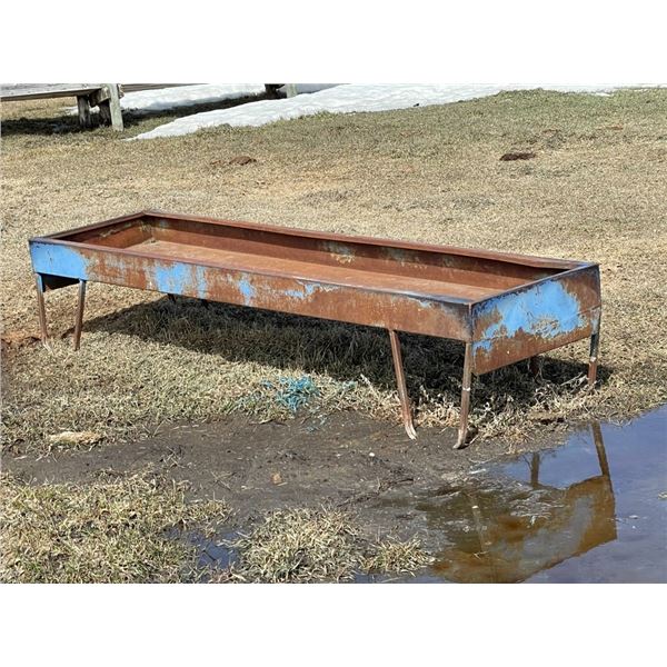 Blue cattle trough