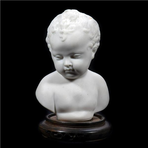 Porcelain Bust of a Baby, on Wood Stand