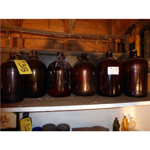 6- GLASS BROWN JUGS