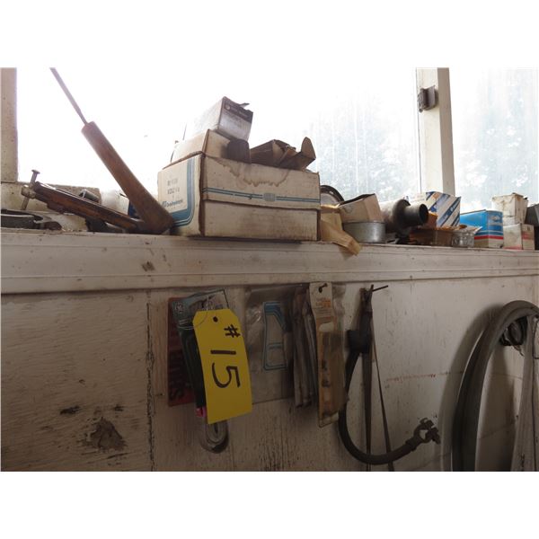 SPROCKETS, RIVETS, FASTENERS, CRESCENT WRENCHES (ON WALL)