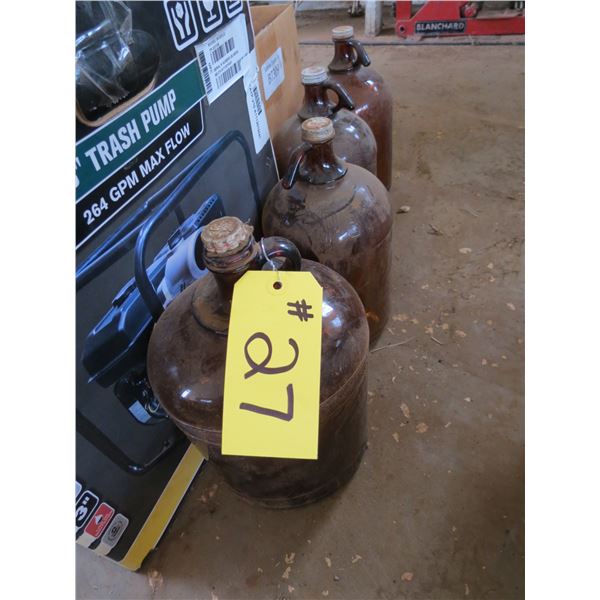 15 - BROWN 1 GALLON JUGS