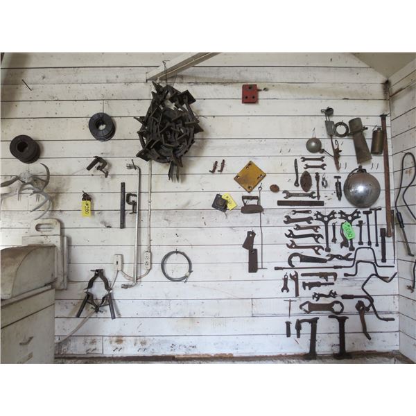 QTY OF OLD TOOLS AND MISC. (ON THE WALL)