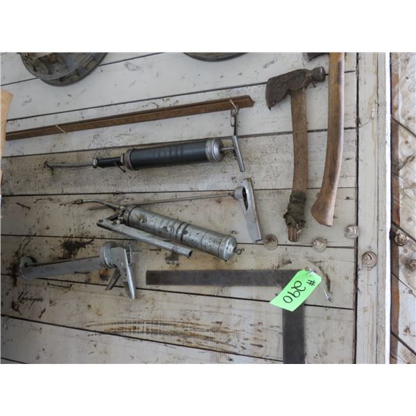 GREASE GUNS, AXES, SQUARE BEAUTY RINGS (ON WALL)