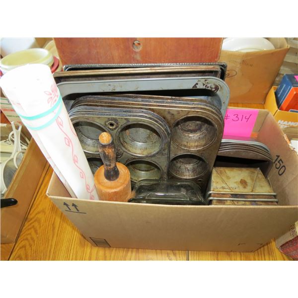 WOODEN CUTTING BOARD, COOKIE SHEETS, CAKE PAN, MUFFIN TINS, BREAN TINS, ETC