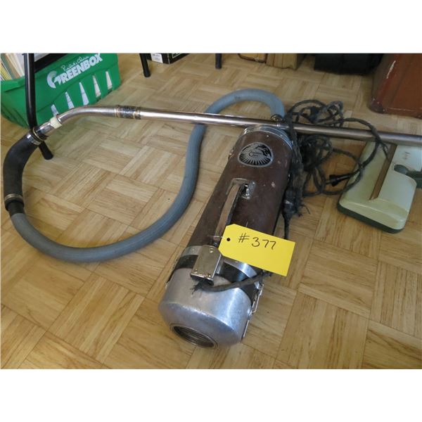2- OLDER ELECTROLUX VACUUM AND BAG OF ACCESS.