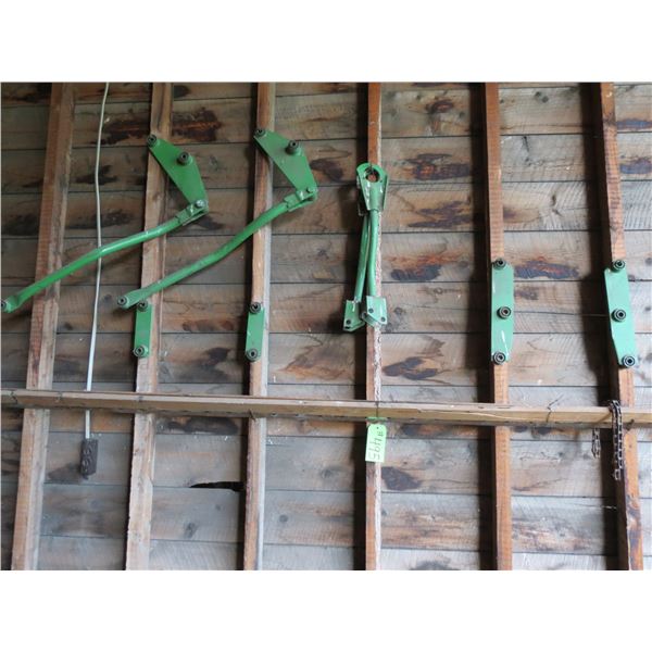 GREEN PARTS (ON WALL AND GROUND) AND KNIVES