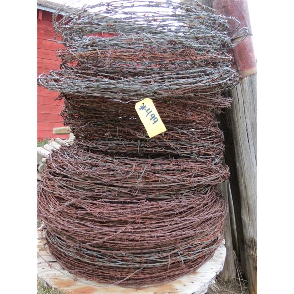 OLD BARB WIRE AND ROLL OF CABLE