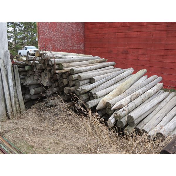 PILE OF WOOD POSTS