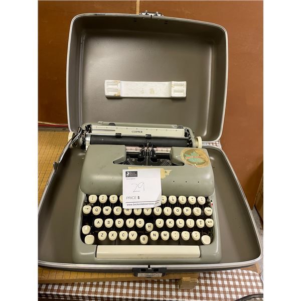 Clipper typewriter with case