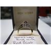 Image 2 : LADIES 10KT RING W/RED STONE & 24 SMALL DIAMONDS - SZ 6 1/4