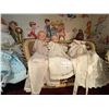 Image 1 : Nursery - 4 Dolls & Wicker Chair