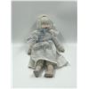 Image 1 : 3-Faced Porcelain Baby Doll, Zaccar
