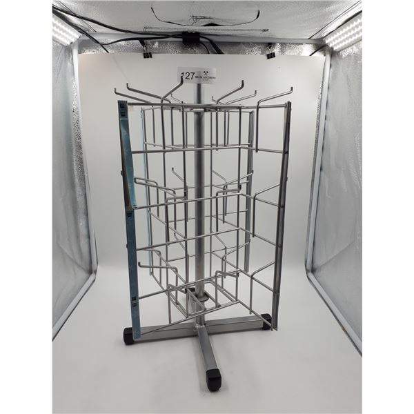 Small spinning merchandise rack - Beck Auctions Inc.